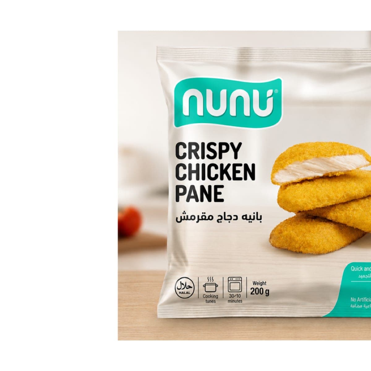 A Nunu freezer bag of flattened breaded chicken pane fillets standing on a kitchen counter, shot from the front.